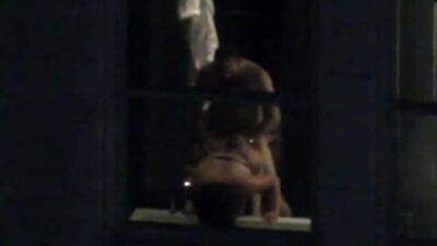 Fucking at the Hotel Window - voyeurhit.com